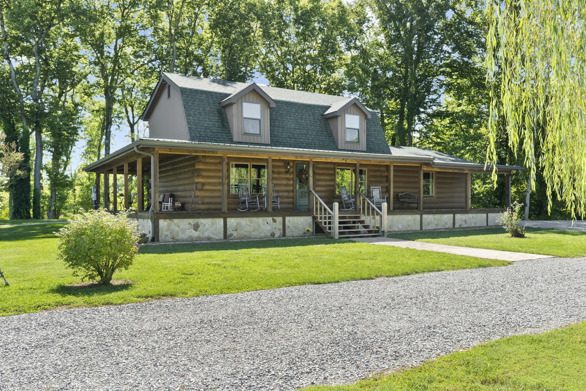546 Hiwassee Road Lebanon, TN 37087 - Photo 4 of 67 a front view of a house with a yard and garage