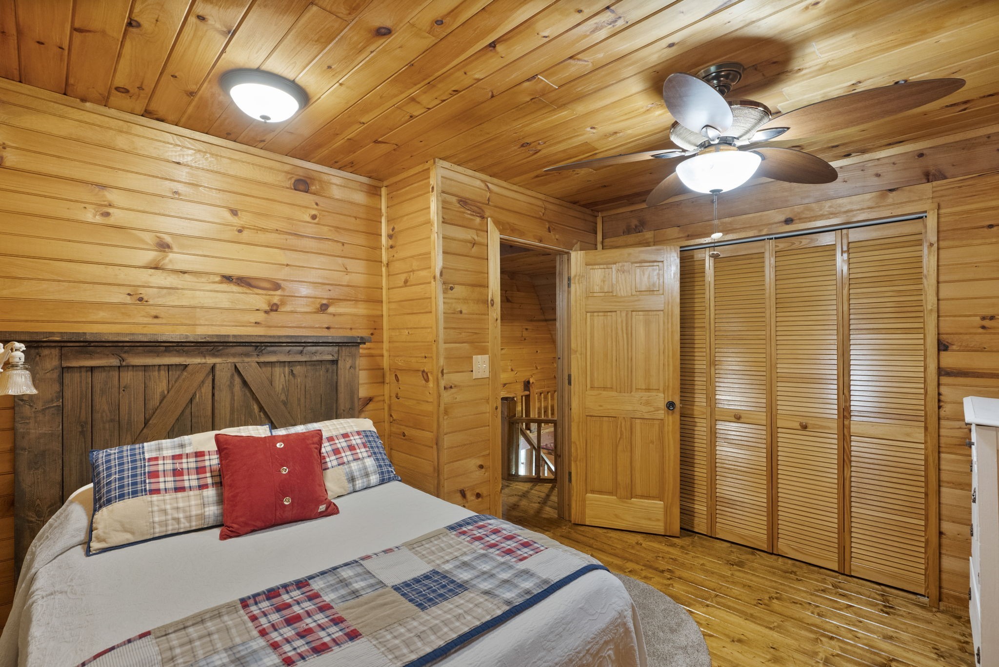 546 Hiwassee Road Lebanon, TN 37087 - Photo 42 of 67 a bed room with a bed and a chandelier
