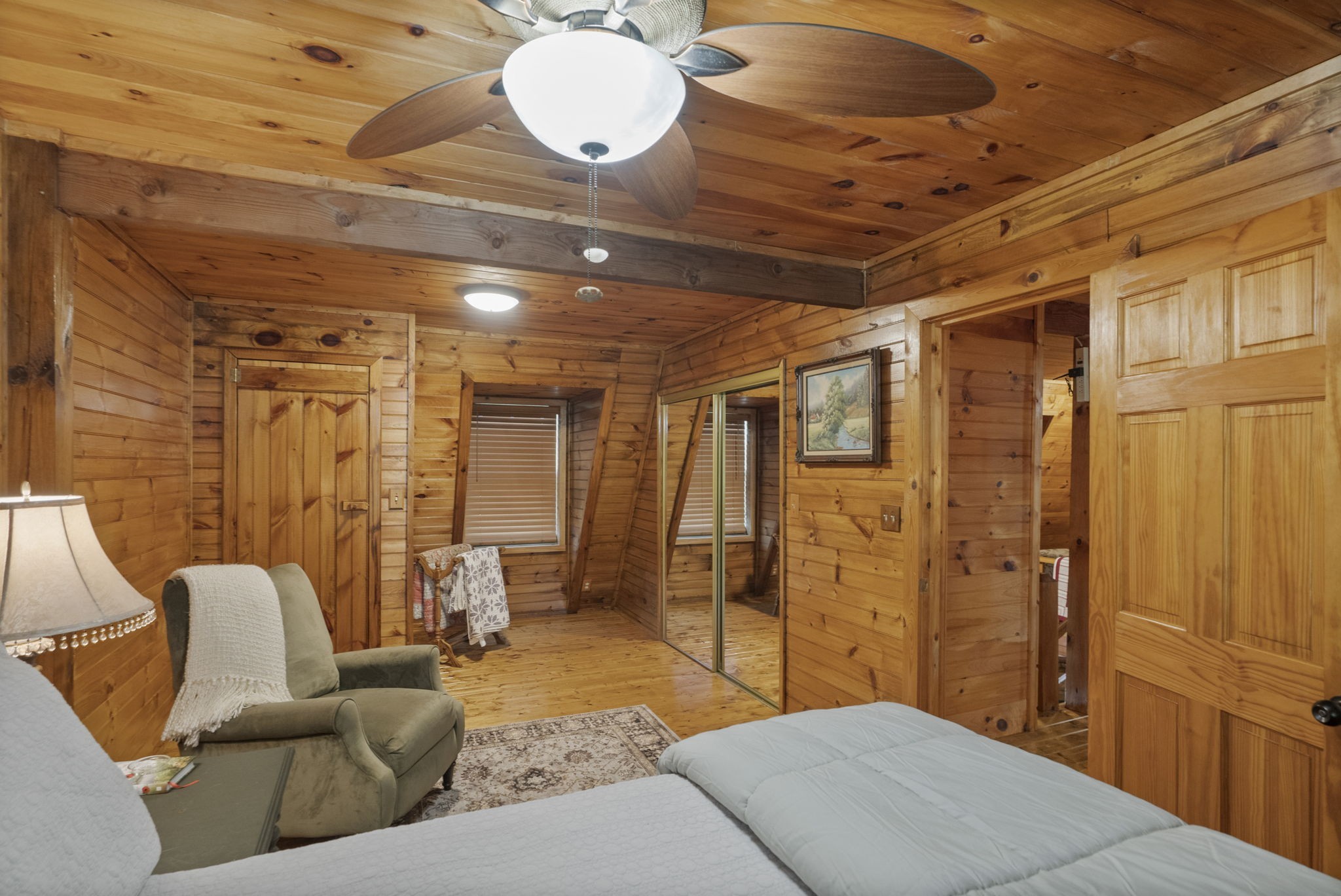 546 Hiwassee Road Lebanon, TN 37087 - Photo 47 of 67 a living room with a couch and a chandelier