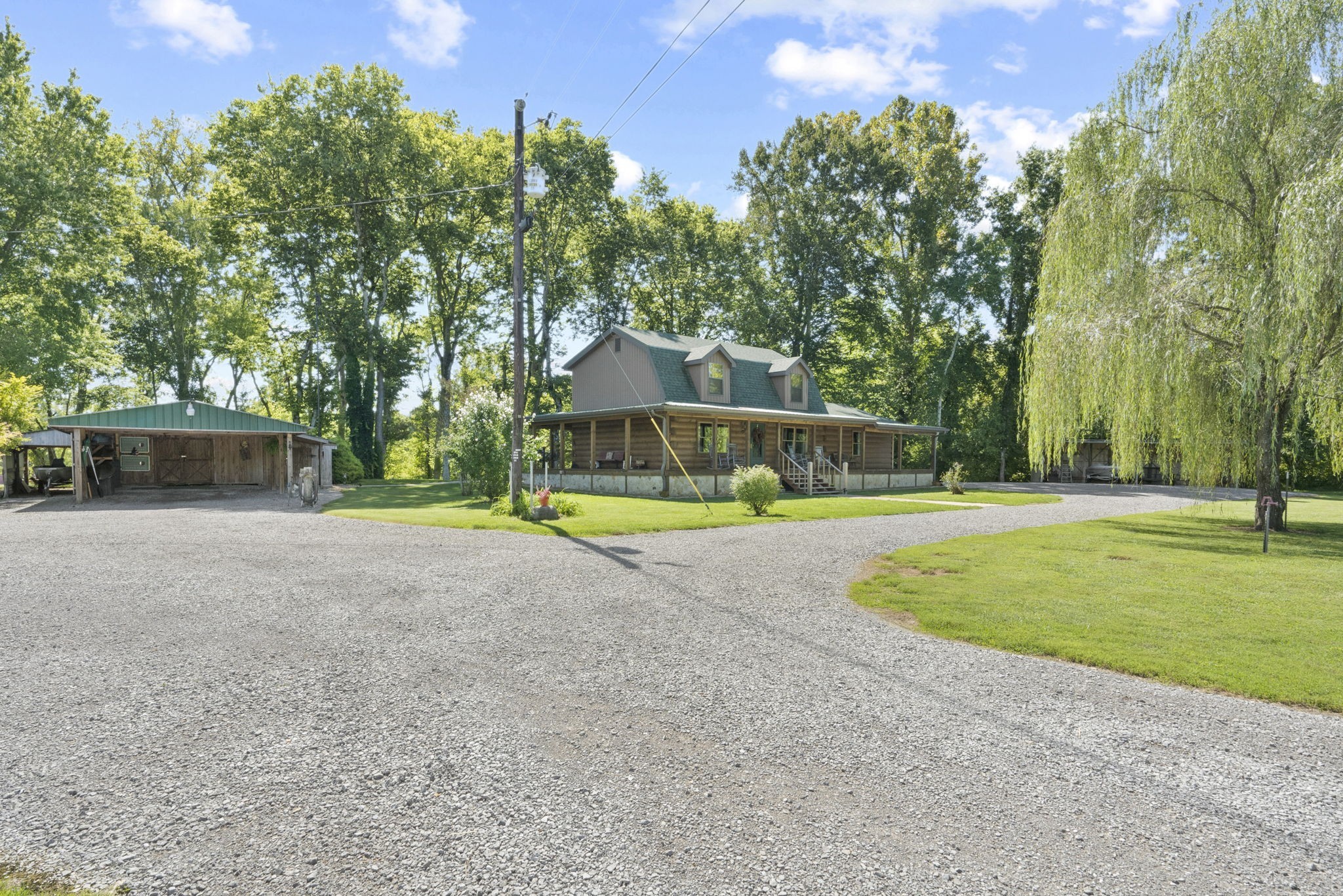 546 Hiwassee Road Lebanon, TN 37087 - Photo 52 of 67 a view of a house with swimming pool and a yard