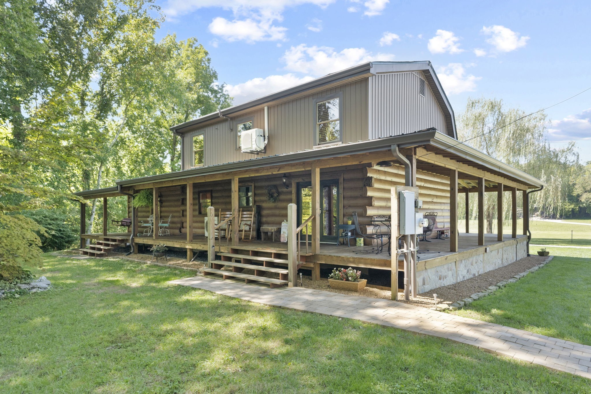 546 Hiwassee Road Lebanon, TN 37087 - Photo 54 of 67 a view of a house with backyard porch and sitting area