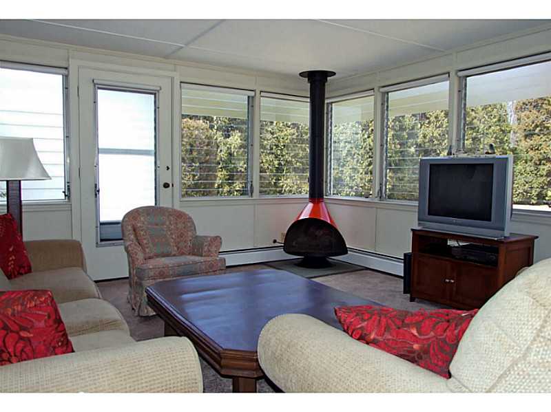 54 Chapin Road Barrington, RI 02806 - Photo 7 of 12 Den/Family/Great Room. Heated florida room with gas fireplace gives sweeping views of back yard