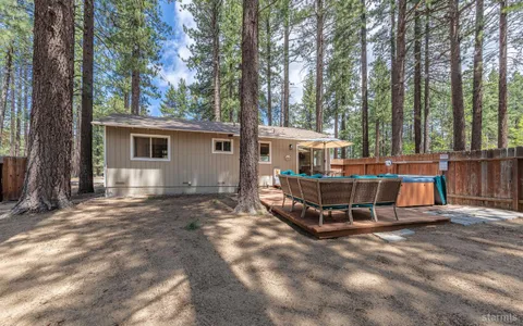 a kitchen with stainless steel appliances a stove sink and microwave
