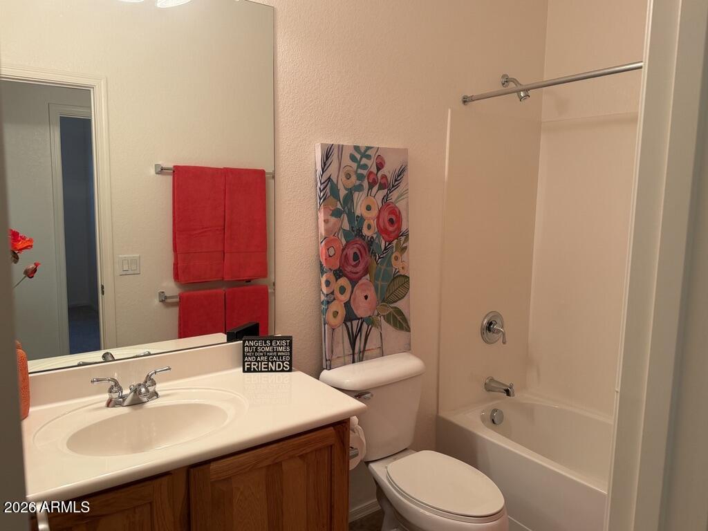 3330 West Ravina Lane Anthem, AZ 85086 - Photo 12 of 29 a bathroom with a sink toilet and shower