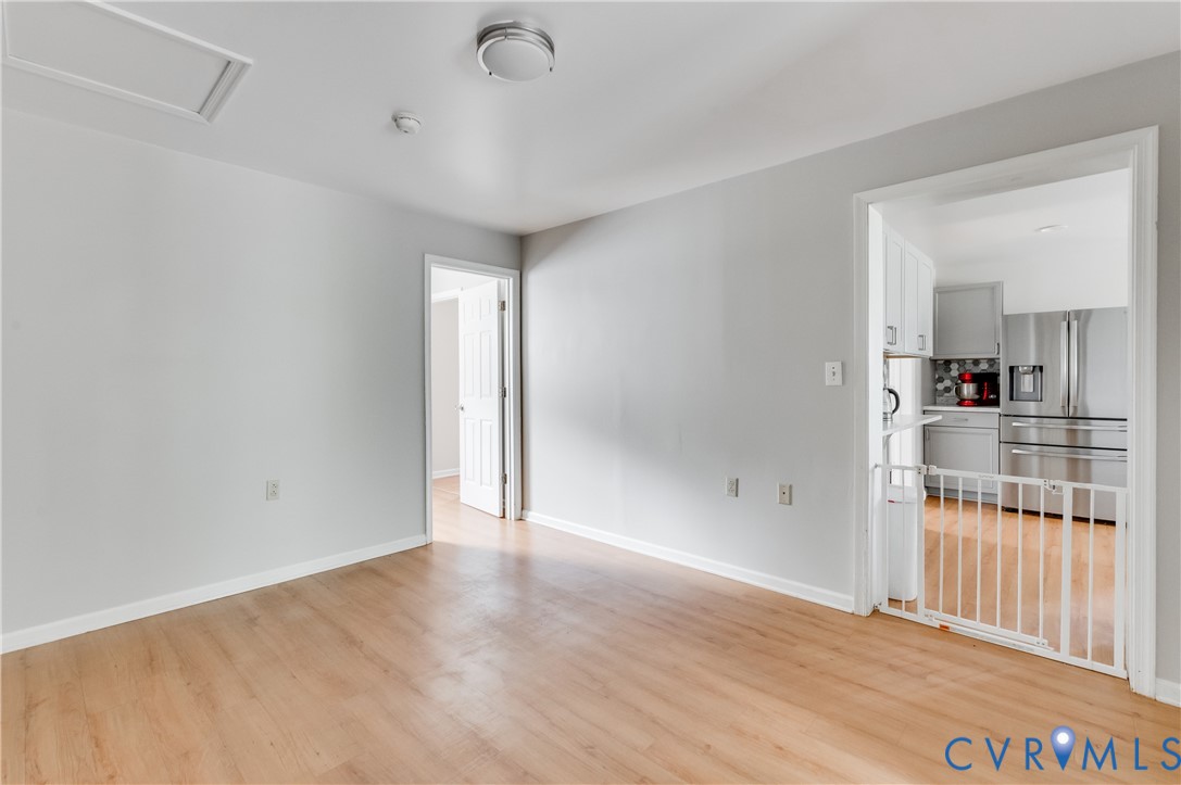 1474 Welsh Tract Road Charlotte Court House, VA 23923 - Photo 16 of 48 Open-concept living space with wood-finish floorin