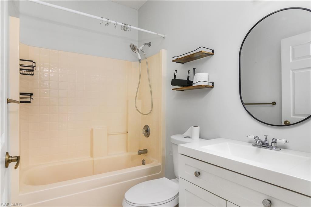18230 Heather Road Fort Myers, FL 33967 - Photo 21 of 28 Full bathroom featuring bathtub / shower combination and vanity