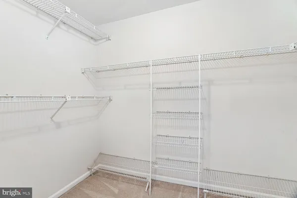 a view of a room with racks on the wall