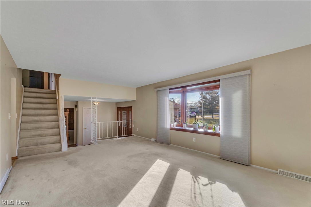 563 North Carpenter Road Brunswick, OH 44212 - Photo 5 of 45 living room with light carpet