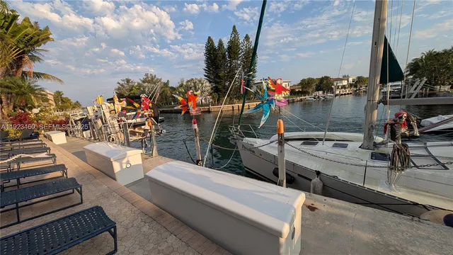 a view of a lounge chair and table in the house