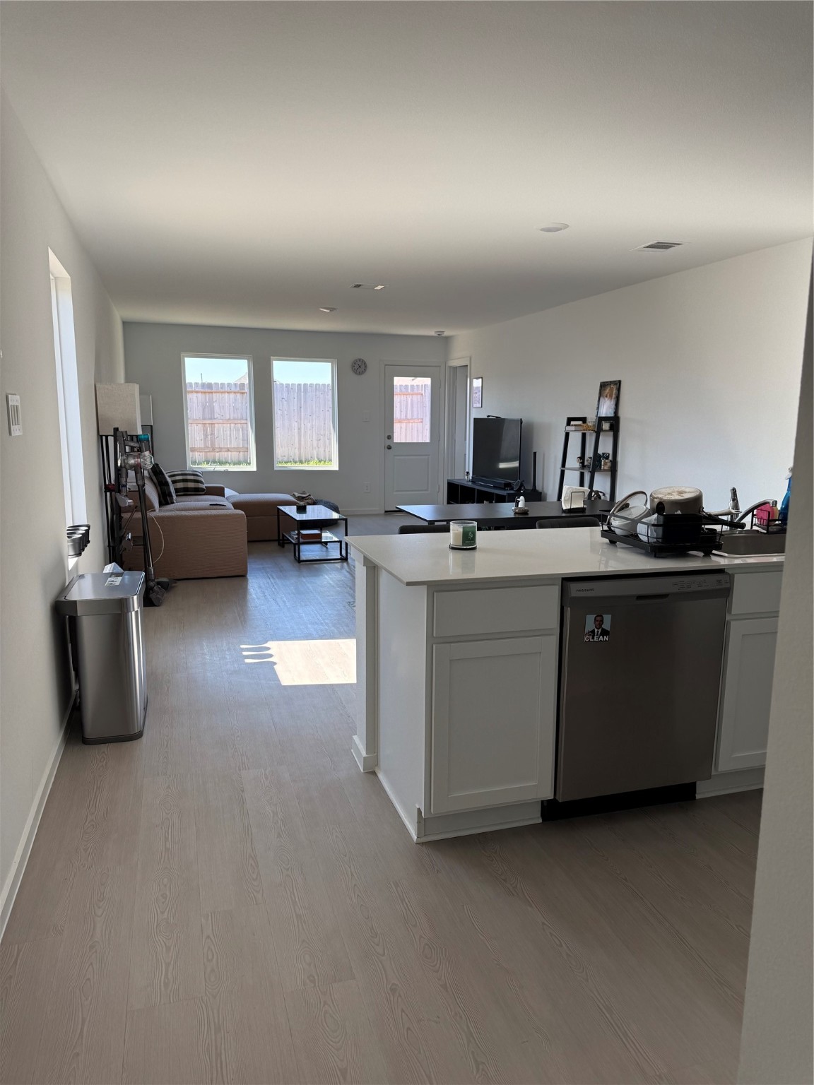 16722 Largetooth Aspen Lane New Caney, TX 77357 - Photo 16 of 37 a kitchen with a sink stove top oven and cabinets