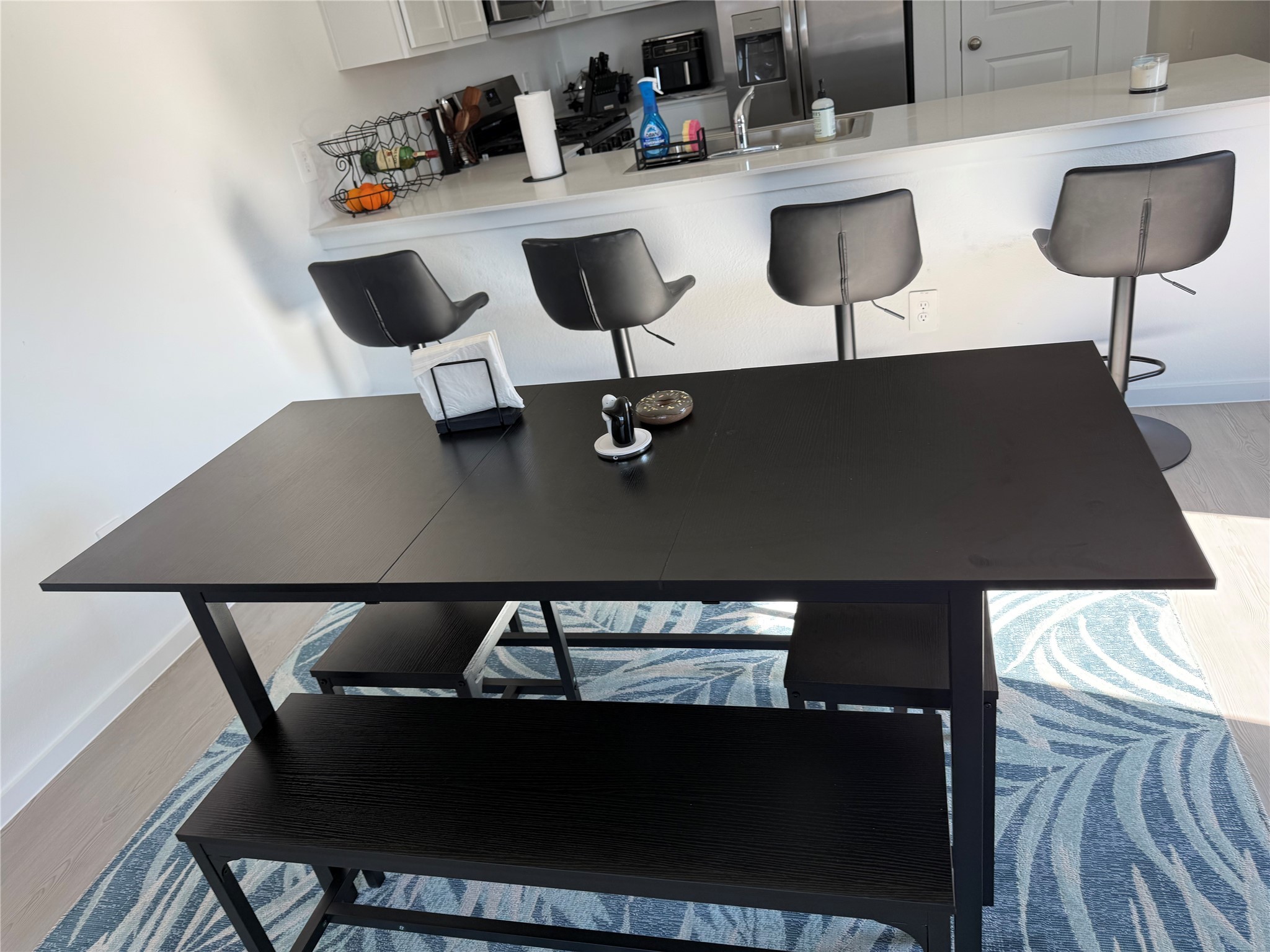16722 Largetooth Aspen Lane New Caney, TX 77357 - Photo 19 of 37 a view of a dining room with furniture and wooden floor