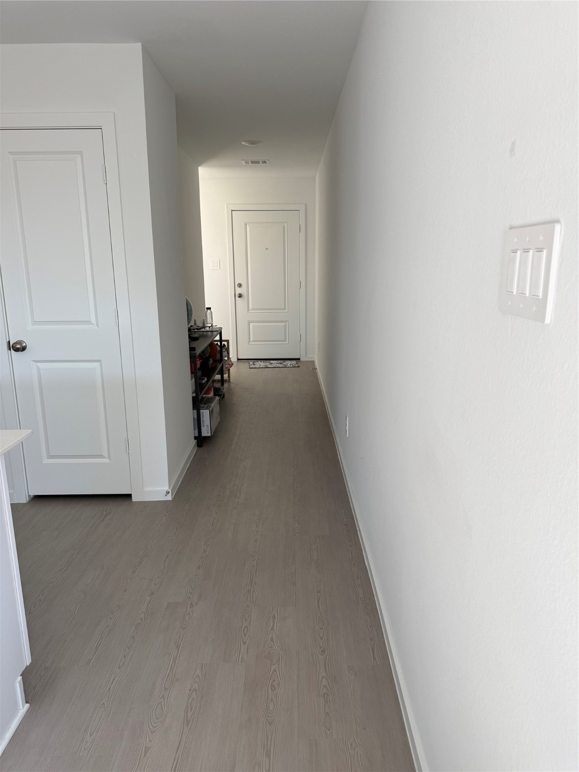 16722 Largetooth Aspen Lane New Caney, TX 77357 - Photo 5 of 37 a view of hallway with livingroom and furniture