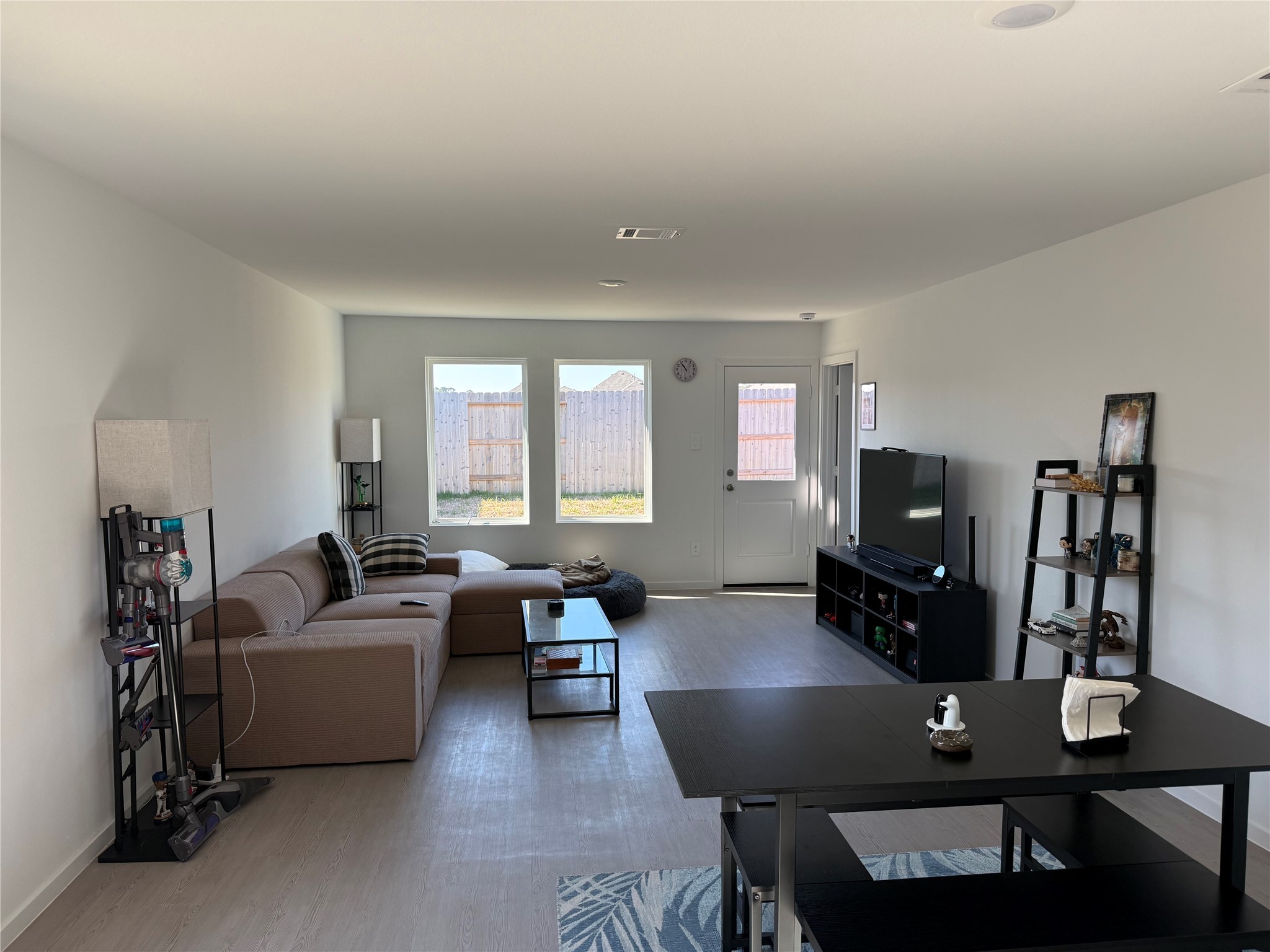 16722 Largetooth Aspen Lane New Caney, TX 77357 - Photo 7 of 37 a living room with furniture and wooden floor