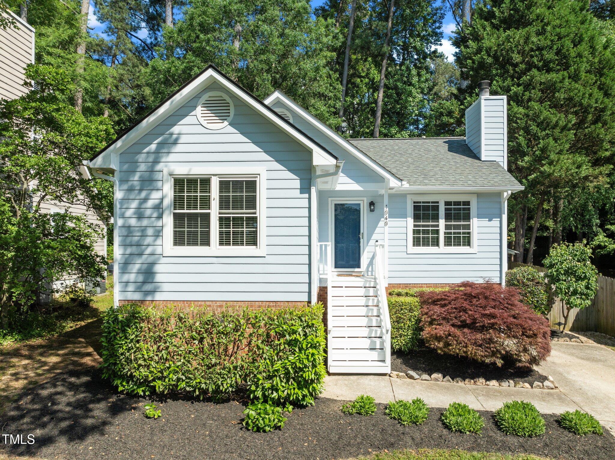1040 Mills Street Raleigh, NC 27608 - Photo 1 of 21 a house view with a outdoor space