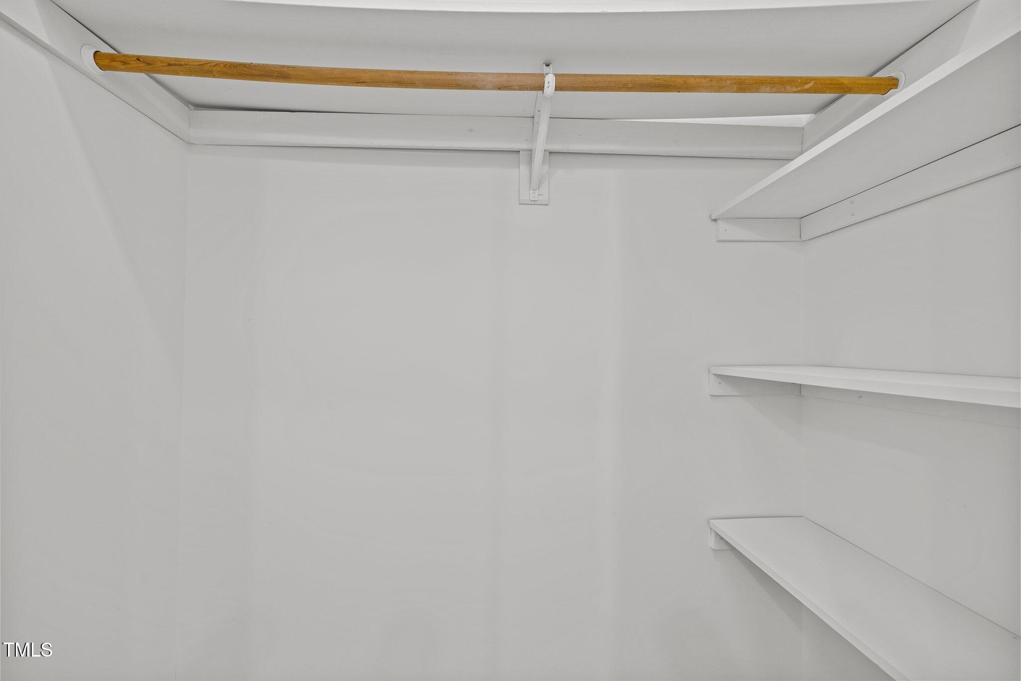 1040 Mills Street Raleigh, NC 27608 - Photo 18 of 21 a view of a room with racks on the wall