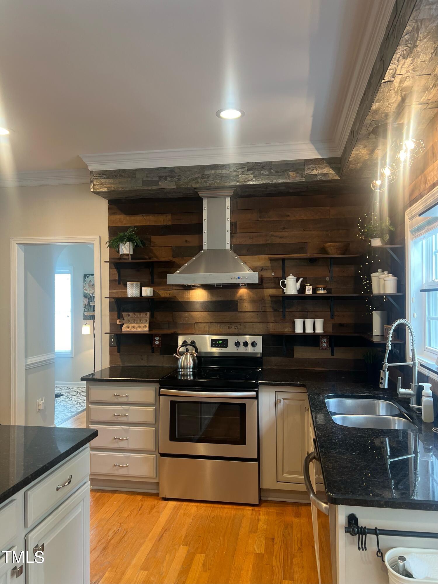 107 Whitney Lane Durham, NC 27713 - Photo 11 of 42 a kitchen with a stove and a microwave