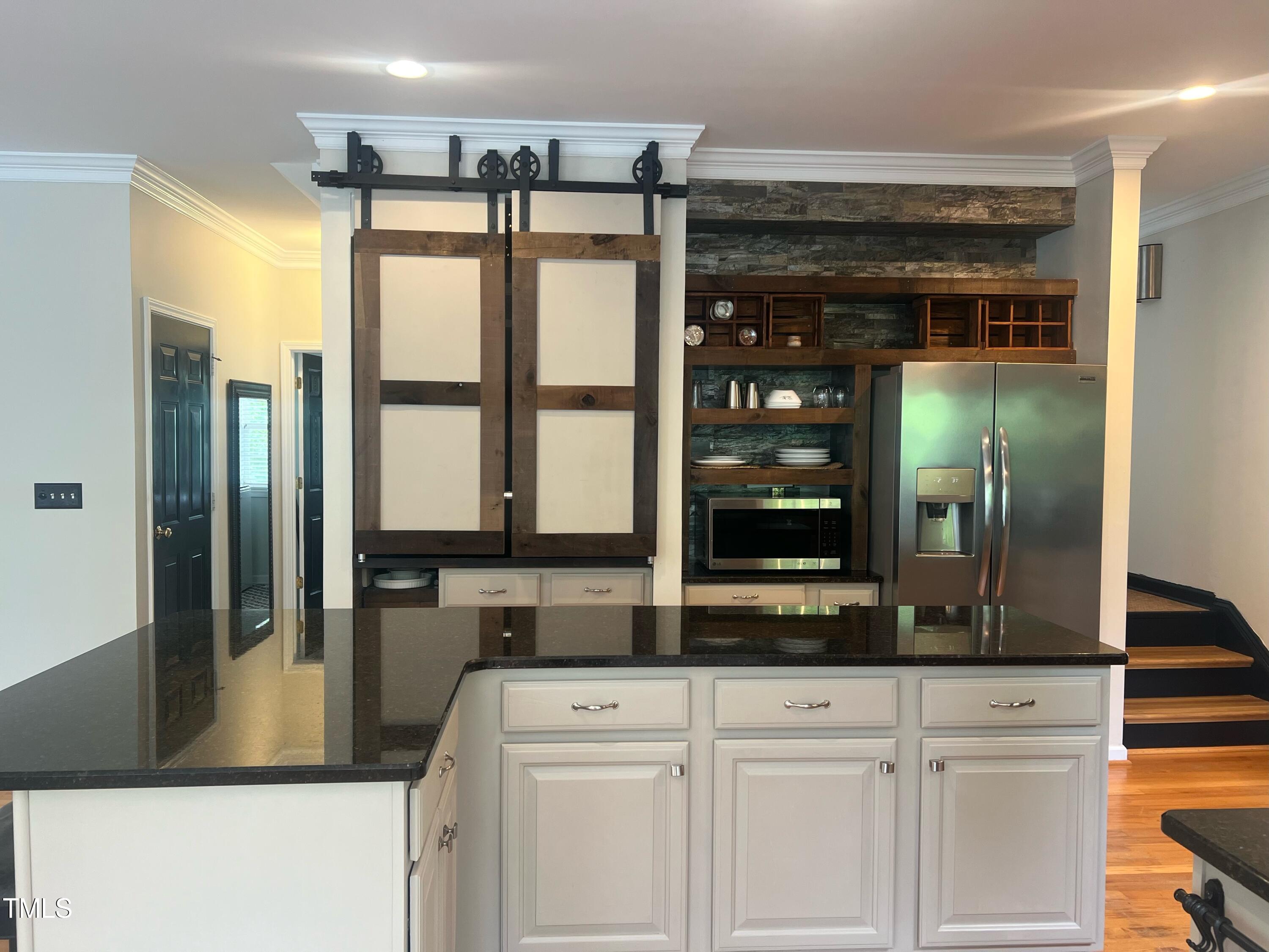 107 Whitney Lane Durham, NC 27713 - Photo 12 of 42 a view of a bathroom with a sink and mirror