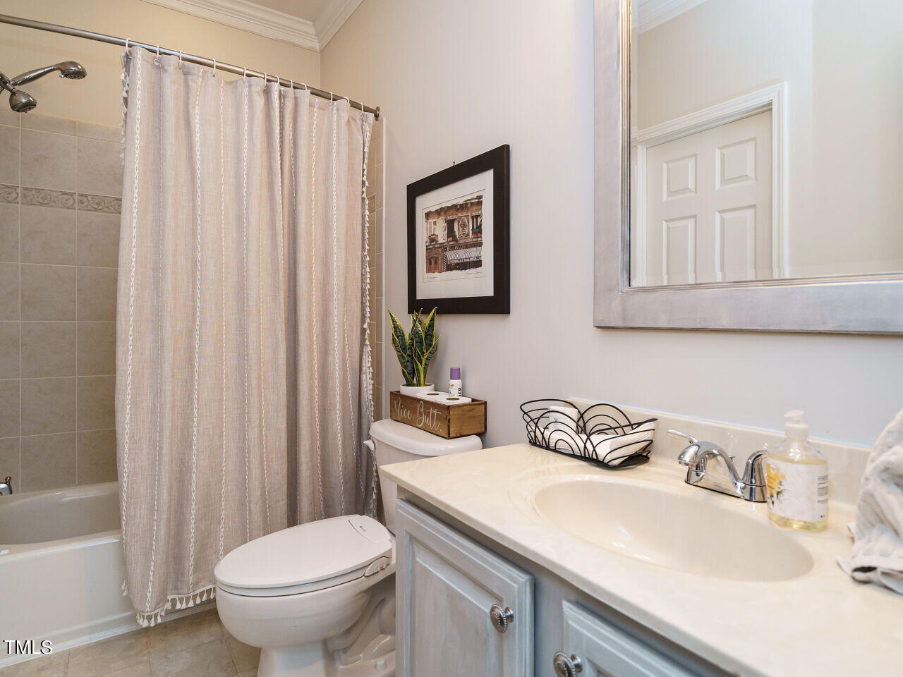 107 Whitney Lane Durham, NC 27713 - Photo 23 of 42 a bathroom with a sink toilet and shower