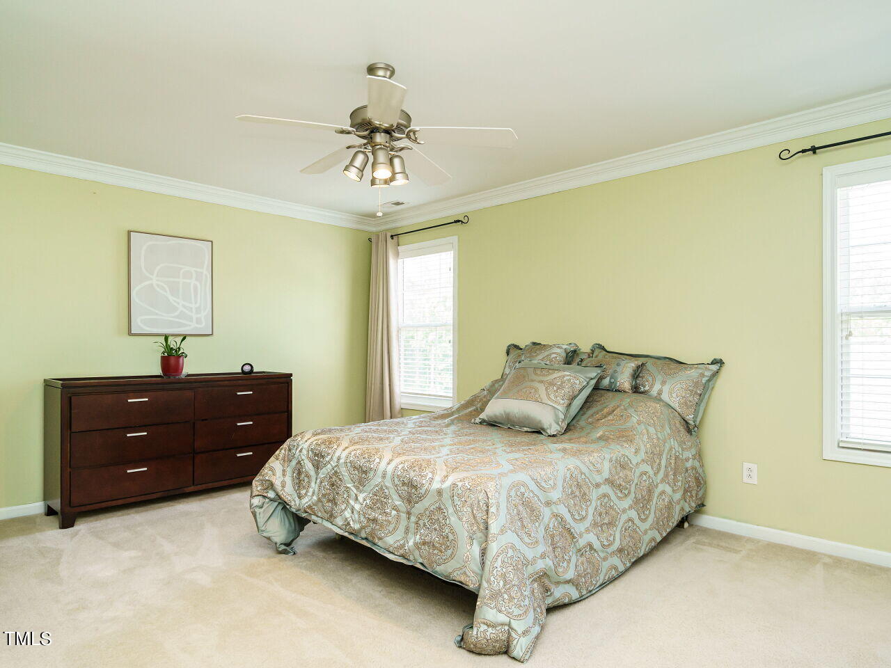 107 Whitney Lane Durham, NC 27713 - Photo 26 of 42 a bedroom with a bed and window