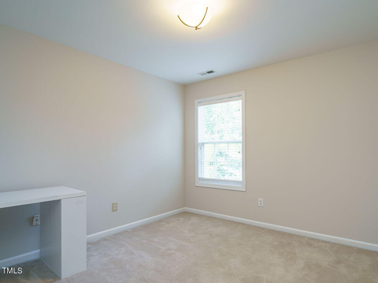 107 Whitney Lane Durham, NC 27713 - Photo 31 of 42 an empty room with a window