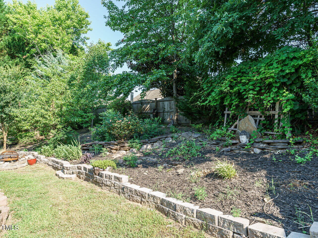 107 Whitney Lane Durham, NC 27713 - Photo 39 of 42 a backyard of a house with outdoor seating