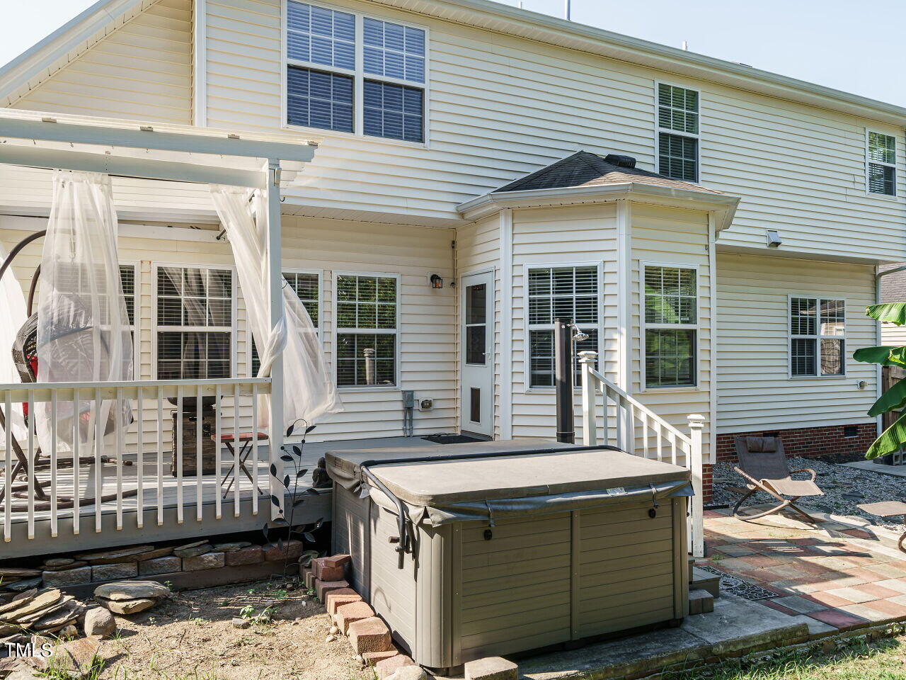 107 Whitney Lane Durham, NC 27713 - Photo 40 of 42 front view of a house with a table and chairs
