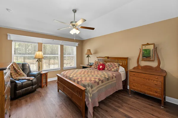 a bed room with a bed and a couch