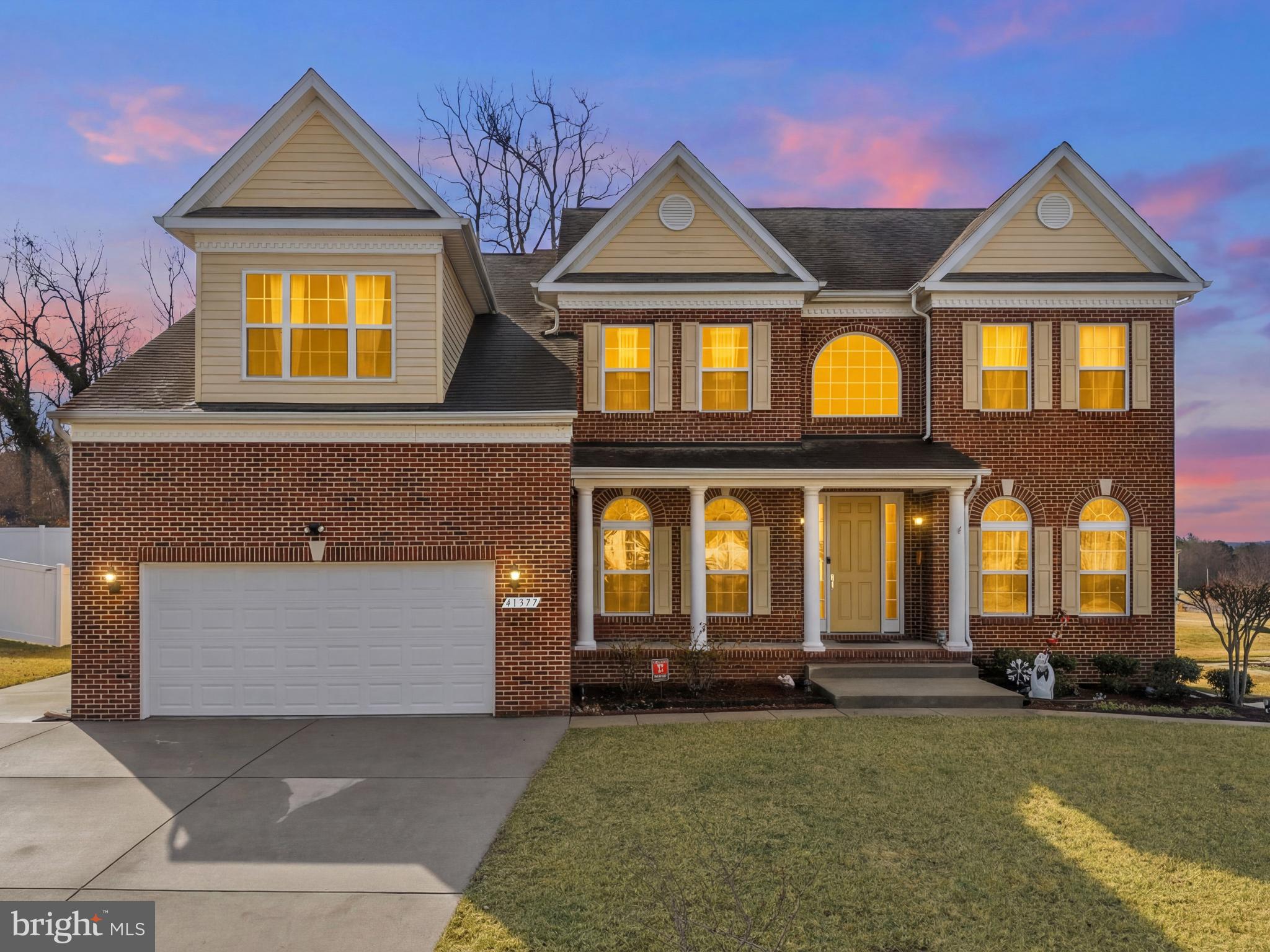 41377 Doctors Crossing Road Leonardtown, MD 20650 - Photo 3 of 62 Elegant brick home at twilight glow.