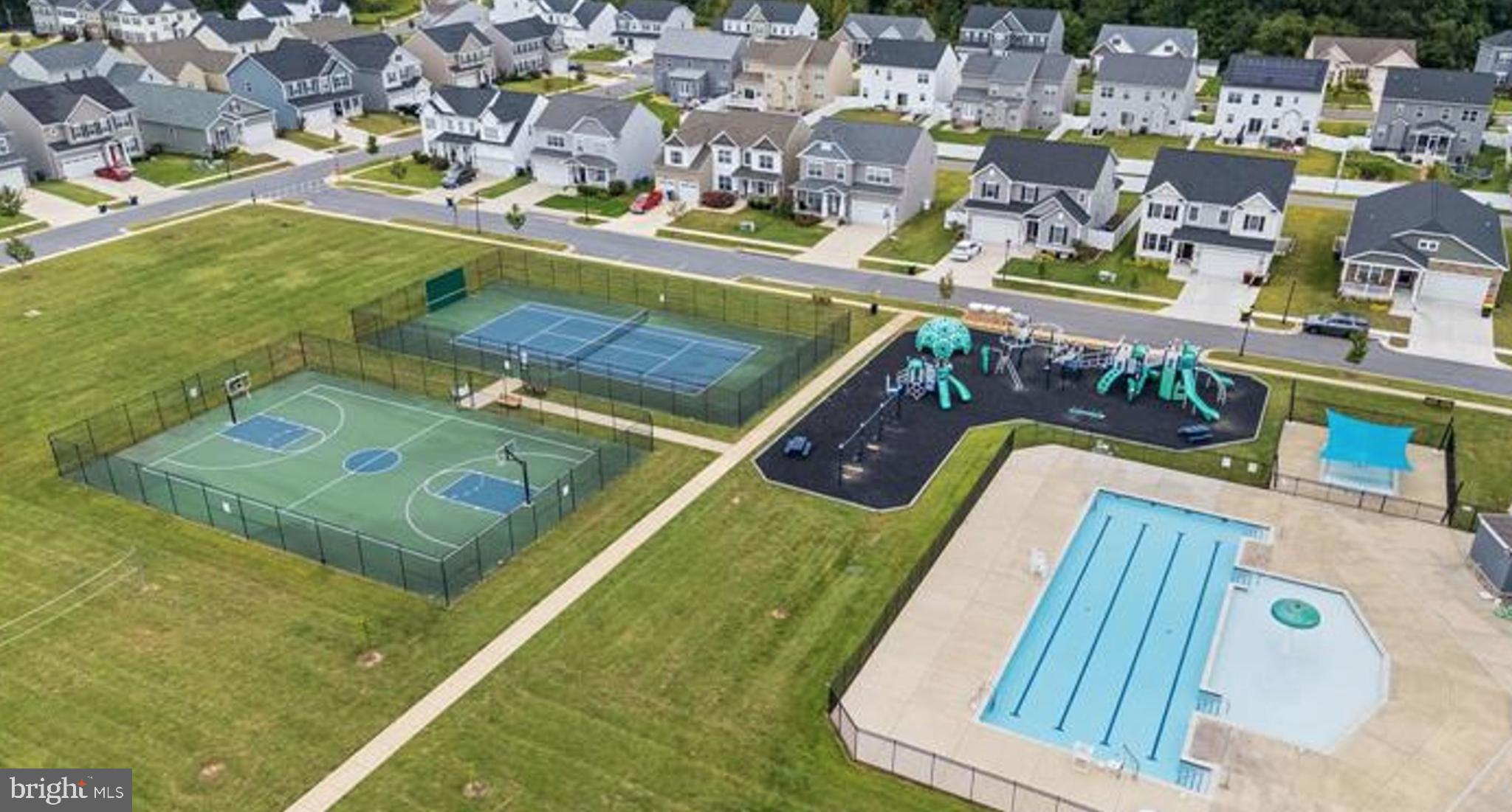 41377 Doctors Crossing Road Leonardtown, MD 20650 - Photo 45 of 62 Community amenities: courts and poolside fun.