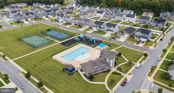 a view of a swimming pool with a lounge chairs