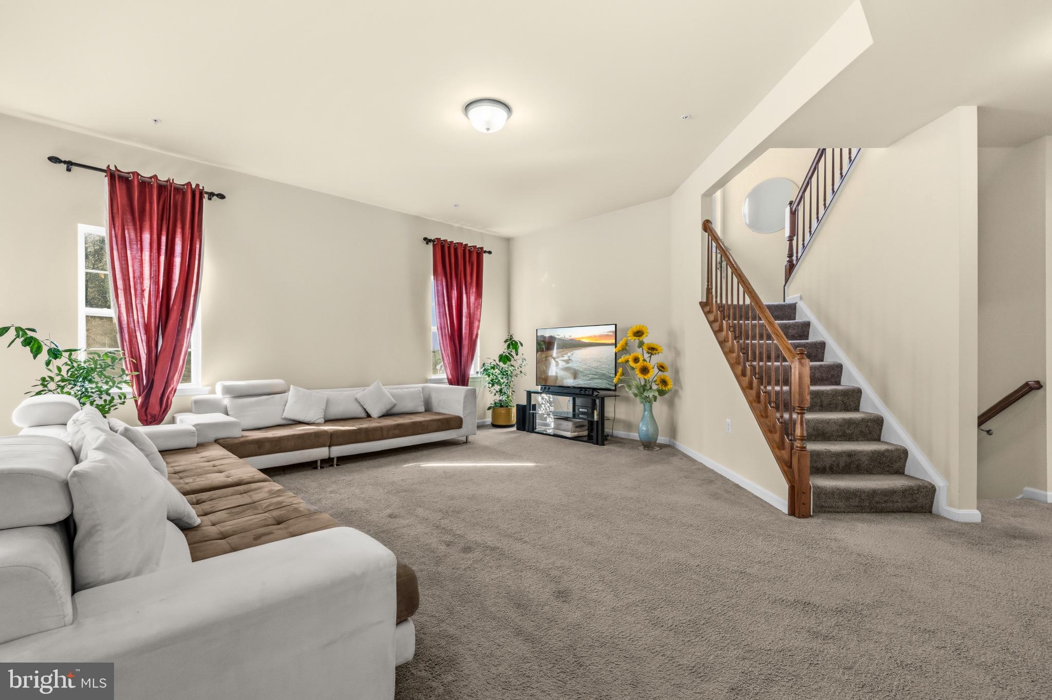 41377 Doctors Crossing Road Leonardtown, MD 20650 - Photo 8 of 62 Family room with large sectional sitting area