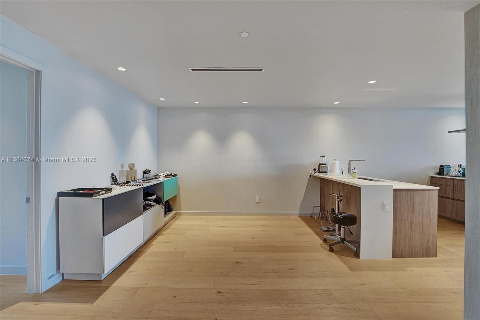 360 Ocean Drive, Unit 906S Key Biscayne, FL 33149 - Photo 24 of 33 a kitchen with a stove and a sink