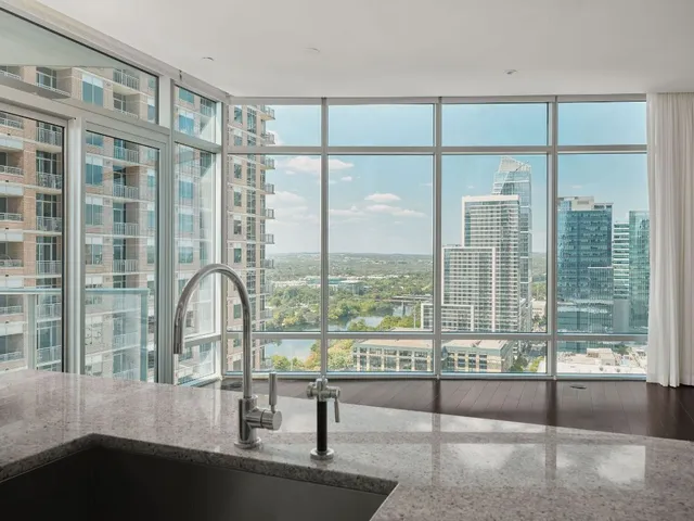 a kitchen with stainless steel appliances a stove and a refrigerator