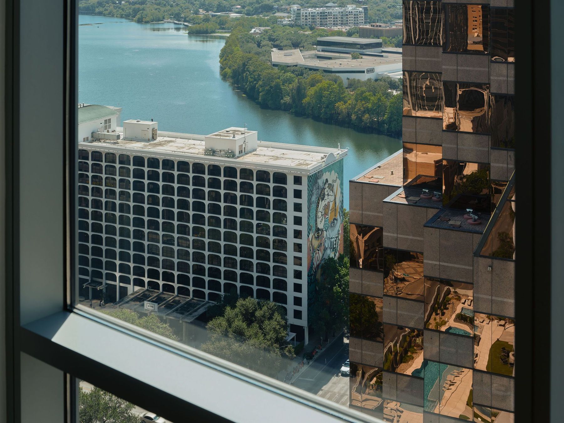 200 Congress Avenue, Unit 23C Austin, TX 78701 - Photo 22 of 40 a view of a lake from a balcony
