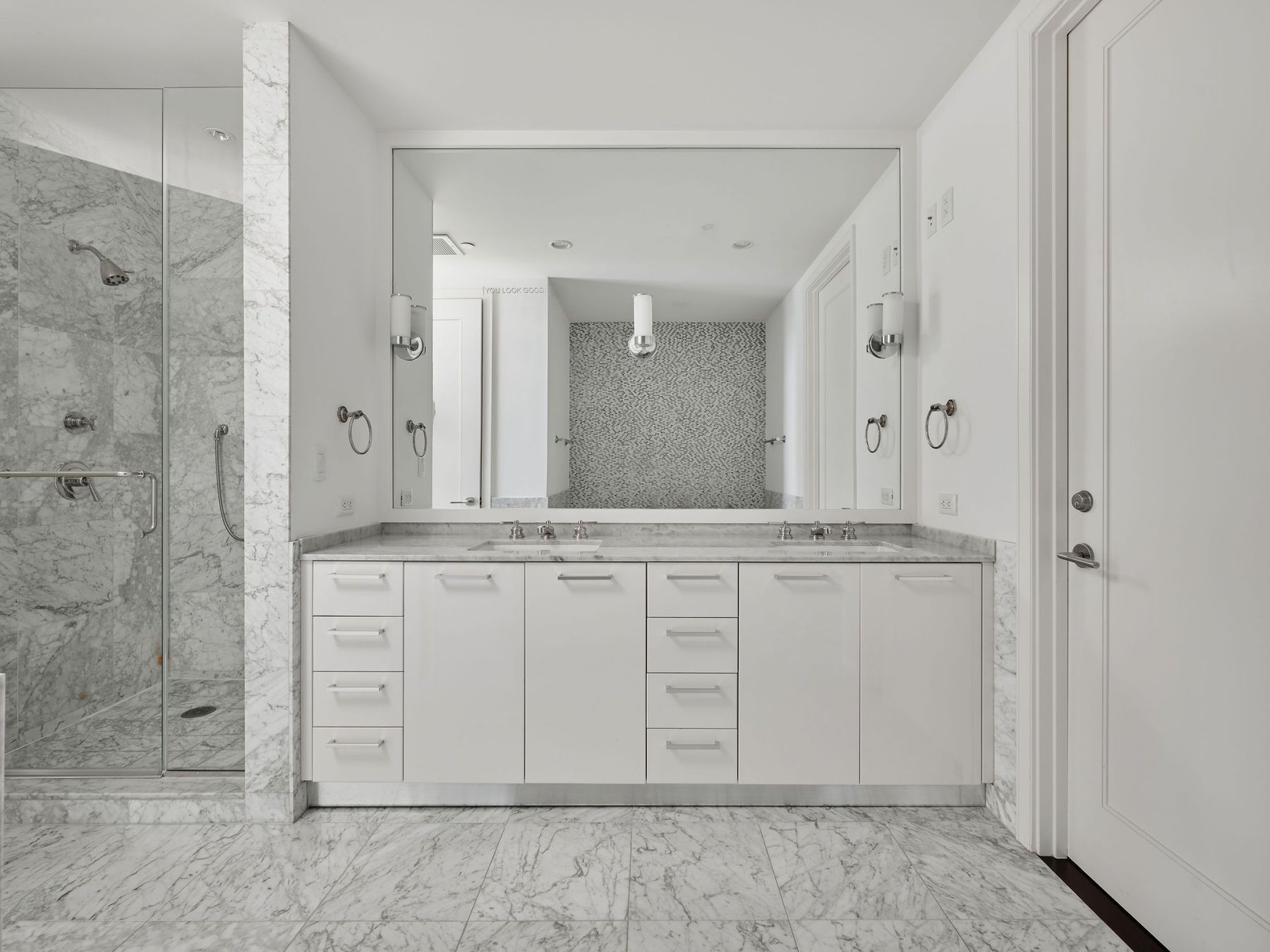 200 Congress Avenue, Unit 23C Austin, TX 78701 - Photo 25 of 40 a bathroom with a granite countertop sink mirror and shower