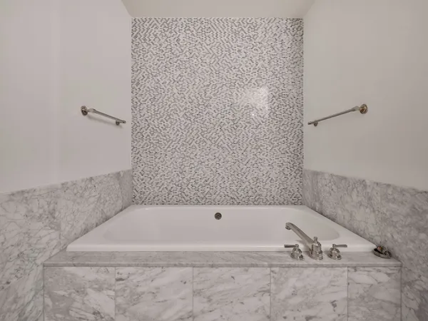 a bathroom with bathtub