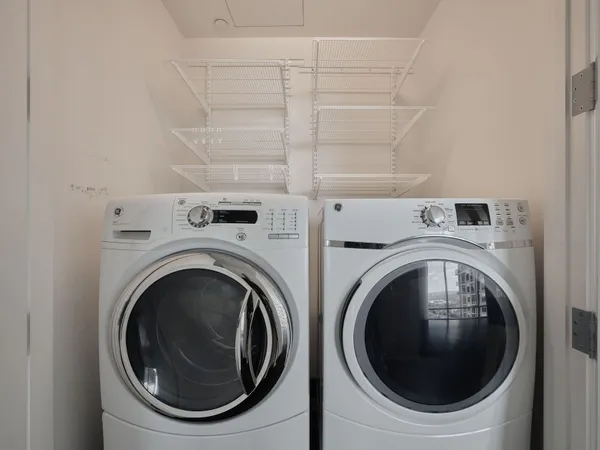 a utility room with dryer and washer