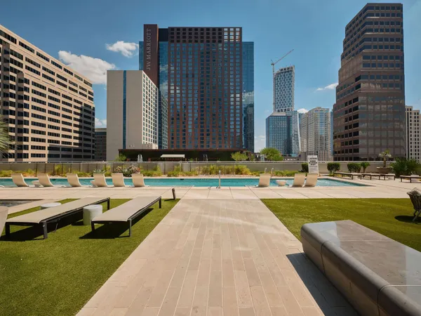 a view of swimming pool with outdoor seating