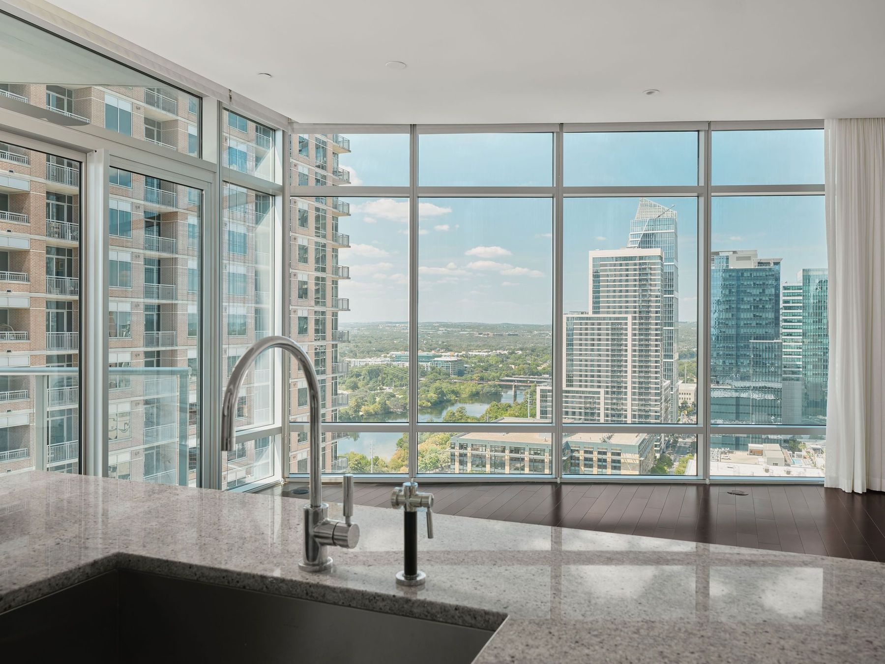 200 Congress Avenue, Unit 23C Austin, TX 78701 - Photo 3 of 40 a view of a room with a large window