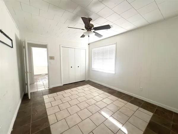 a view of an empty room and window