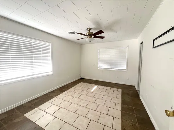 a room with a table and window