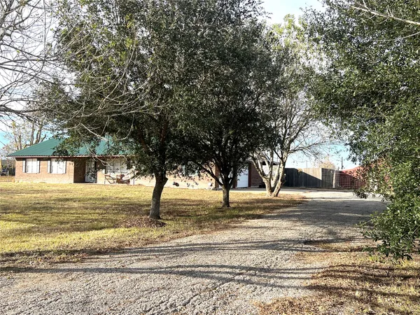 a front view of a house with a ocean view