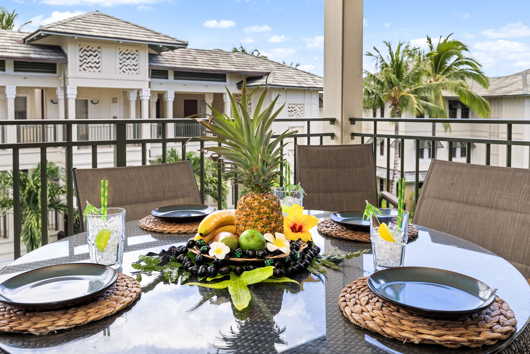 69-1000 Kolea Kai Circle, Unit 16J Waikoloa, HI 96738 - Photo 17 of 25 a view of a chairs and table in the patio