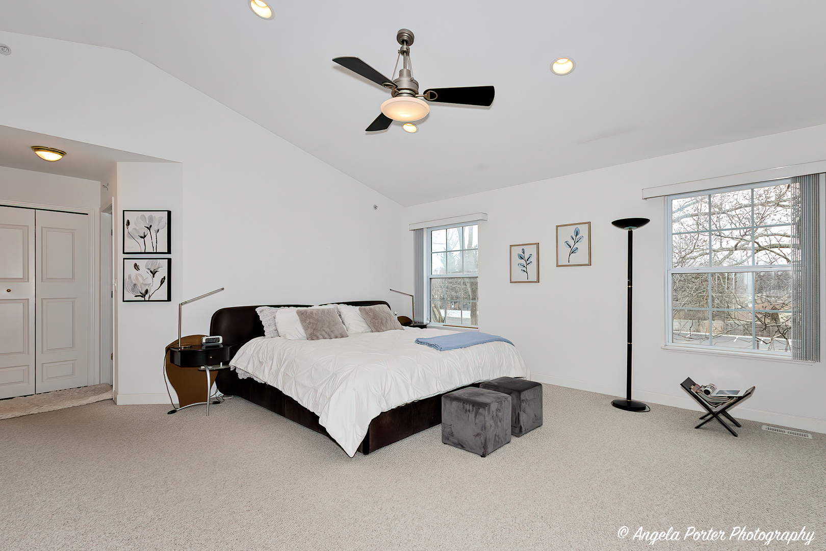 1340 Horizon Trail Wheeling, IL 60090 - Photo 15 of 27 a bedroom with a bed a window and a chandelier