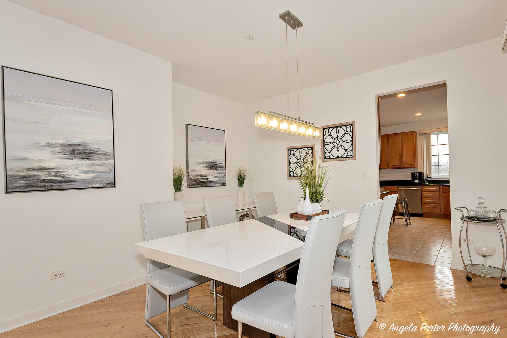1340 Horizon Trail Wheeling, IL 60090 - Photo 9 of 27 a view of a dining room with furniture and wooden floor