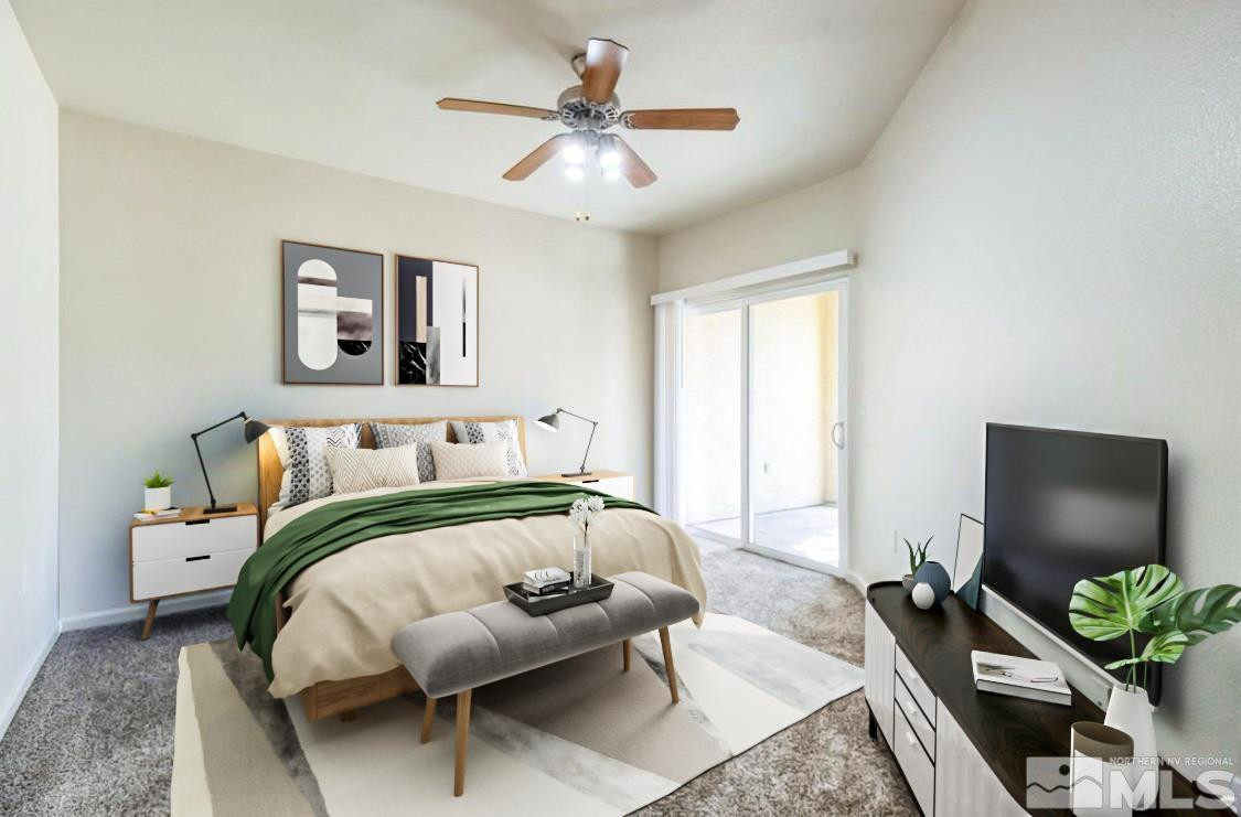 9050 Double R Boulevard, Unit 1412 Reno, NV 89521 - Photo 13 of 18 a bedroom with a bed and a couch