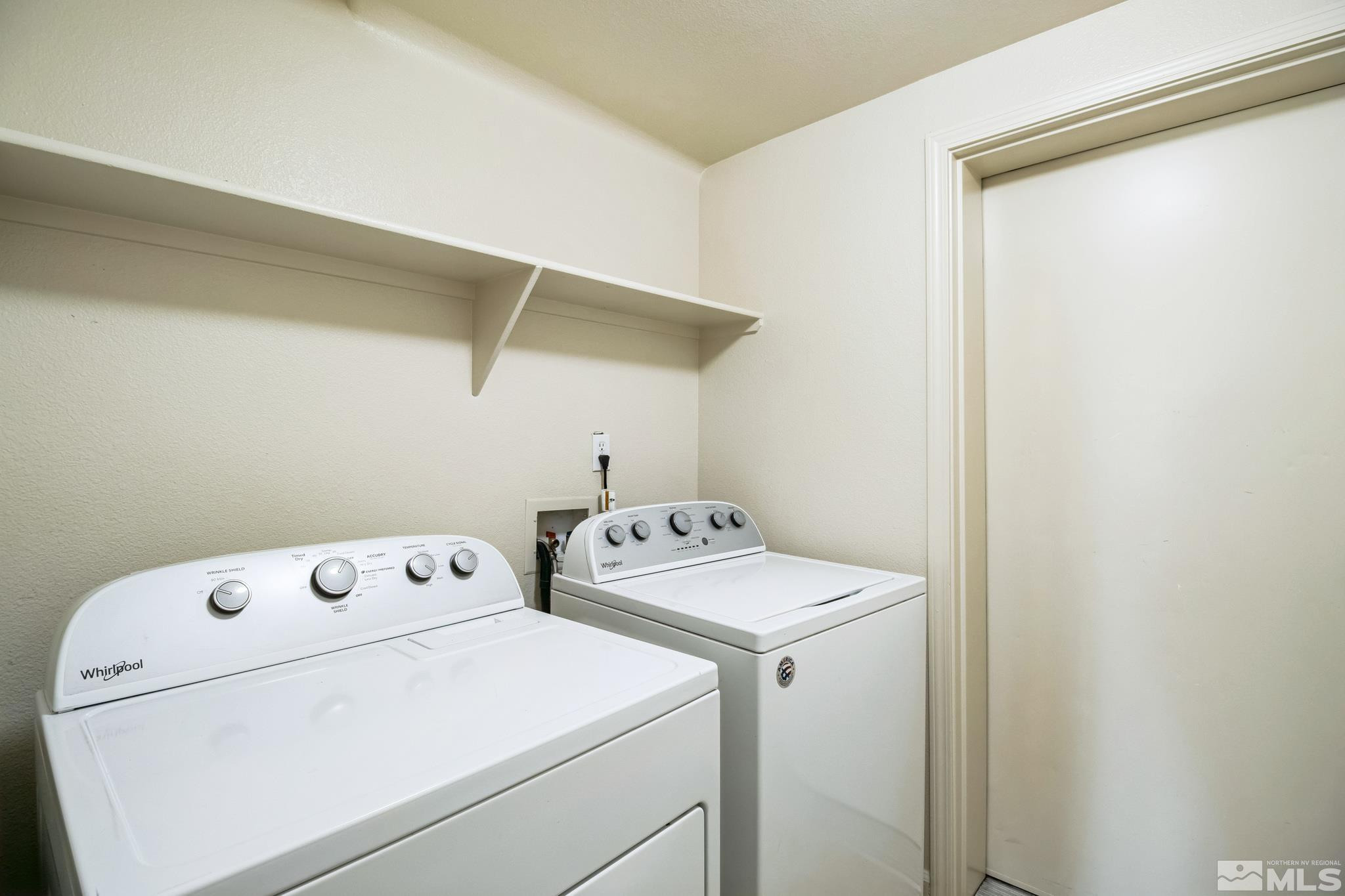 9050 Double R Boulevard, Unit 1412 Reno, NV 89521 - Photo 14 of 18 a utility room with dryer and washer
