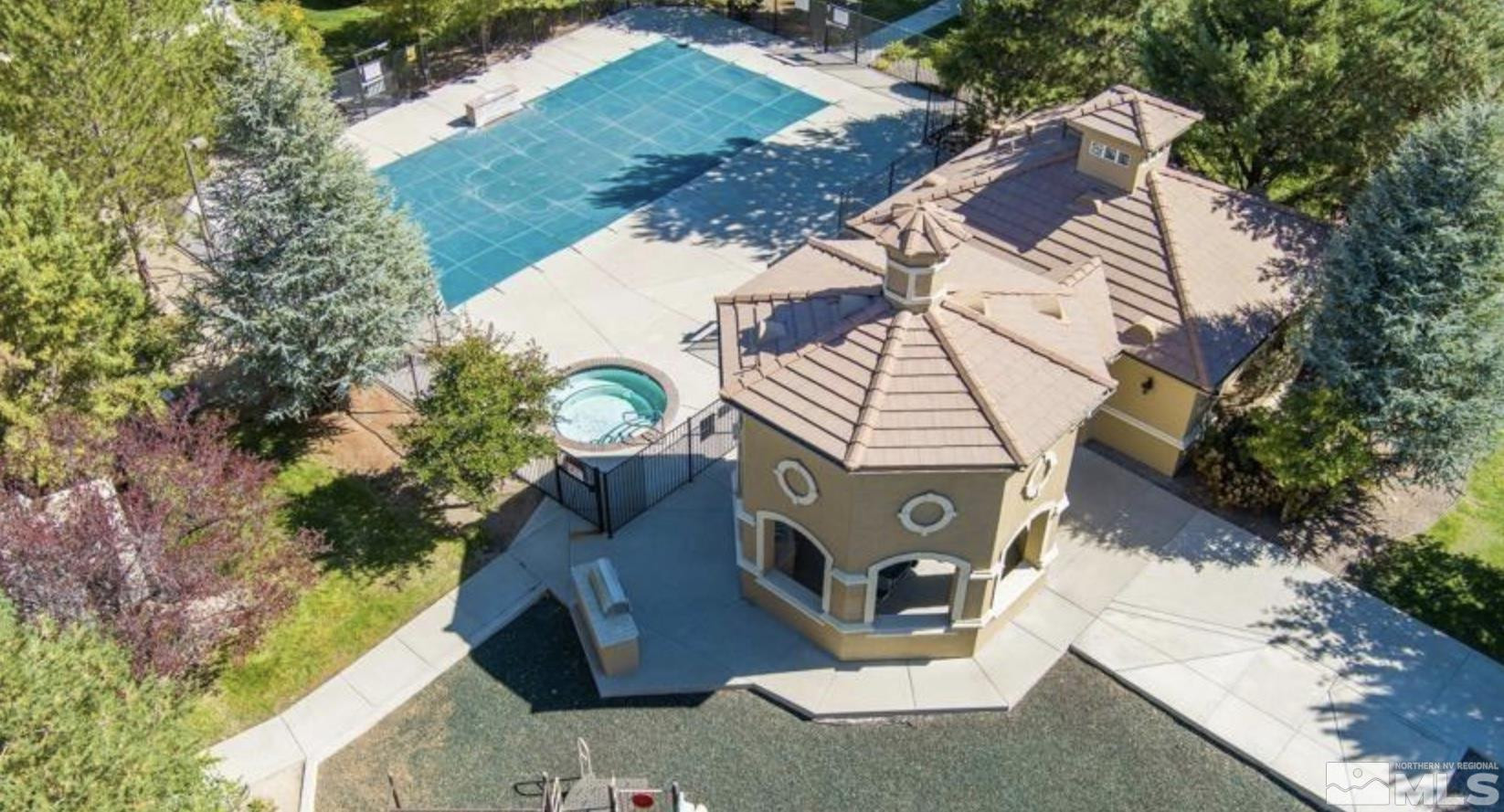 9050 Double R Boulevard, Unit 1412 Reno, NV 89521 - Photo 16 of 18 an aerial view of a house with a yard