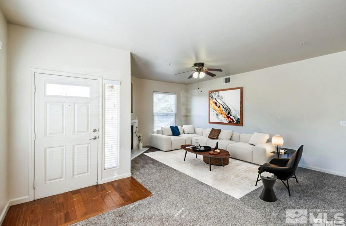 9050 Double R Boulevard, Unit 1412 Reno, NV 89521 - Photo 9 of 18 a living room with furniture and a window