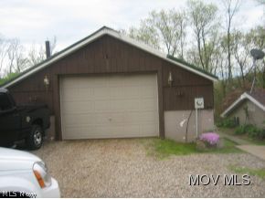 755 Rhodes Road Lowell, OH 45744 - Photo 3 of 14 Huge garage